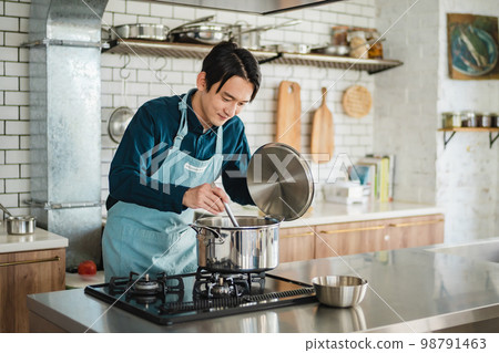 Male Kitchen Cooking Male Kitchen Cooking 98791463