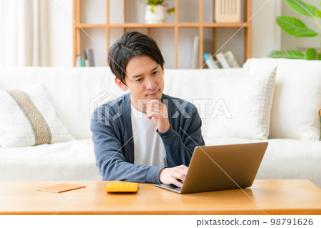 Worried man calculator life plan 98791626