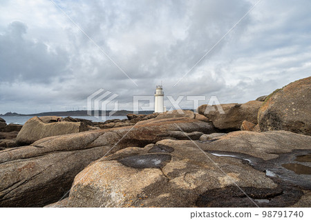 Lighthouse at the Muxia Coast, Galicia, Spain. This is one of the last stages in the jacobean route 98791740