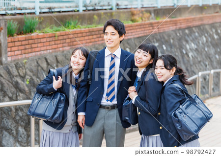 A high school girl who goes to school with a boy student A high school girl who goes to school with a boy student 98792427