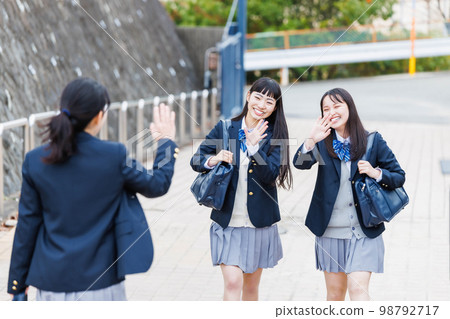 High school student going to school with friends High school student going to school with friends 98792717