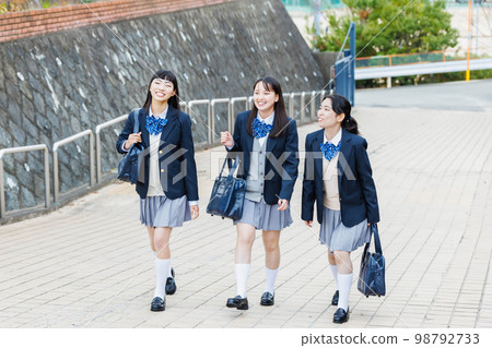 High school student going to school with friends 98792733