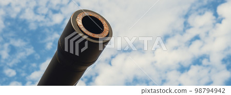 Tower of armored personnel carrier or tank. Heavy weapons of war, sky background. Army equipment for combat and defense. Cannon tower. Details of military equipment Ukraine Russian war 98794942