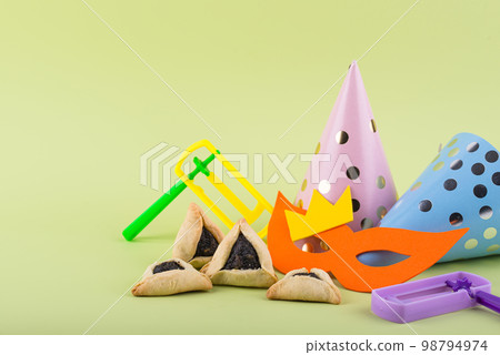 Jewish holiday Purim celebration concept 98794974