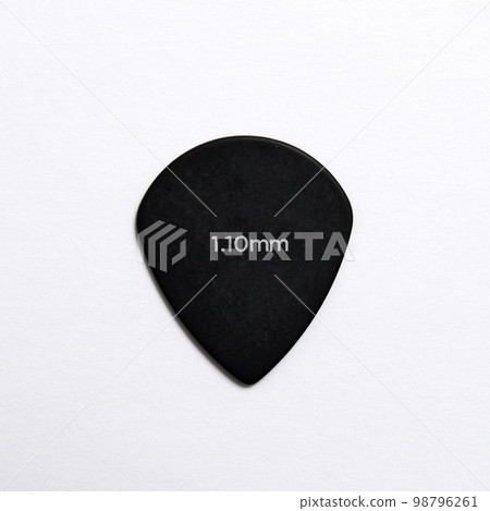 Guitar pick isolated on white background 98796261