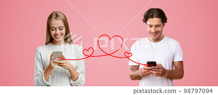 Romantic Man And Woman With Smartphones Sending Love Messages To Each Other 98797094