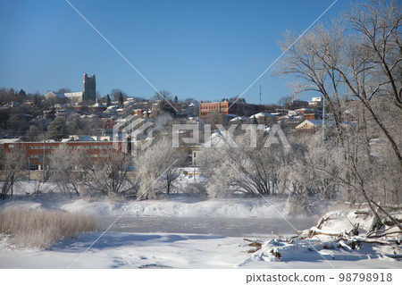 Sherbrooke downtown Quebec Canada, winter landscape cold temperature frozen river mist and fog ice water Sherbrooke downtown Quebec Canada, winter landscape cold temperature frozen river mist and fog ice water 98798918