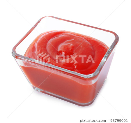 Tasty tomato sauce in glass bowl isolated on white Tasty tomato sauce in glass bowl isolated on white 98799001