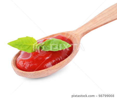Tasty tomato sauce in spoon isolated on white 98799008