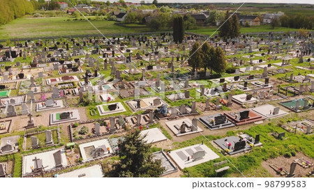 Drone flight over the graves of the cemetery. Drone flight over the graves of the cemetery. 98799583
