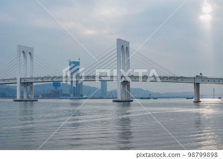 Bridge between the islands at cloudy day. Bridge between the islands at cloudy day. 98799898