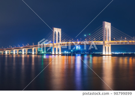 Bridge between the islands at night time. Macau. Bridge between the islands at night time. Macau. 98799899
