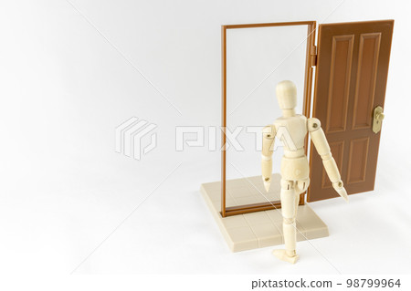 A drawing doll and a door. moving forward image A drawing doll and a door. moving forward image 98799964