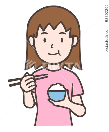 A woman holding a bowl and eating rice 98802293
