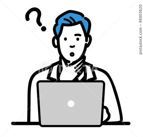 A young male doctor wearing a white coat thinking in front of a laptop 98803620