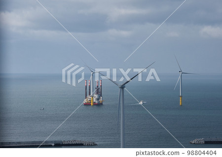 Clean energy wind power generation lined up near Akita Port 98804404