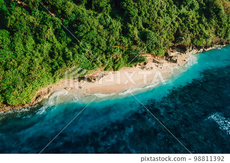 Tropical beach with ocean in Bali. Aerial view of Green bowl beach Tropical beach with ocean in Bali. Aerial view of Green bowl beach 98811392