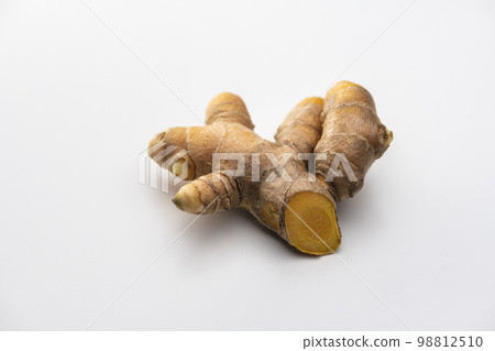Autumn turmeric rhizome on white background 98812510