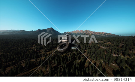 Abandoned car tires in mountains 98814314