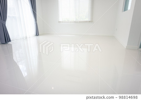 White tile floor in living room. White tile floor in living room. 98814698