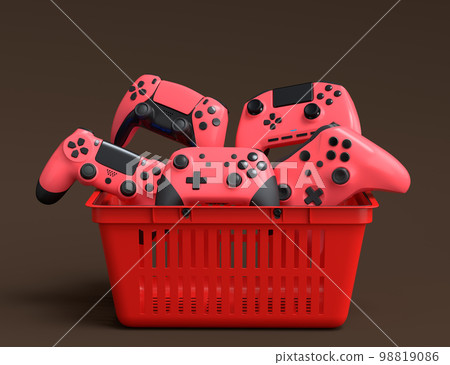 Set of gamer joysticks or gamepads in plastic basket on dark background 98819086