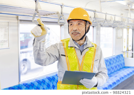 Senior male working at the railway Silver human resources 98824321