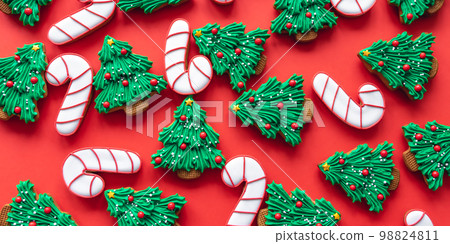 Christmas colored handmade gingerbread cookies, flat lay. Christmas colored handmade gingerbread cookies, flat lay. 98824811