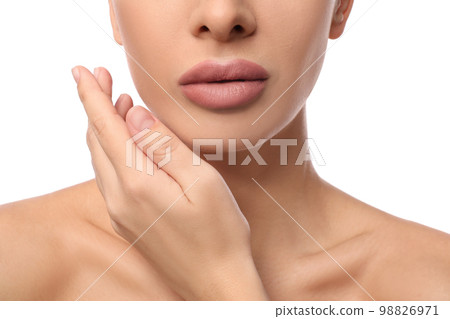 Woman with pink lipstick on white background, closeup 98826971