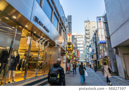 Tokyo cityscape in Japan, overlooking Sunshine Chuo Dori in front of Ikebukuro Station 98827397