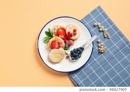Concept of tasty sweet food, cheese pancakes, top view Concept of tasty sweet food, cheese pancakes, top view 98827905