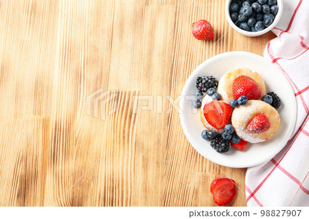 Concept of tasty sweet food, cheese pancakes, space for text Concept of tasty sweet food, cheese pancakes, space for text 98827907