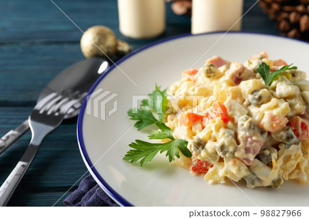 Concept of New year food, tasty Olivier salad Concept of New year food, tasty Olivier salad 98827966