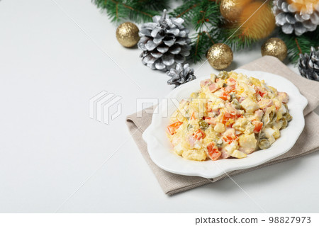 Concept of New year food, Olivier salad, space for text Concept of New year food, Olivier salad, space for text 98827973