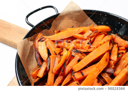 Concept of tasty food, fried sweet potato, close up Concept of tasty food, fried sweet potato, close up 98828366