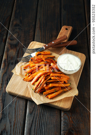 Concept of tasty food, fried sweet potato Concept of tasty food, fried sweet potato 98828382