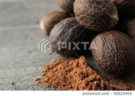 Concept of spices and condiments, nutmegs, space for text 98828468