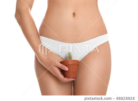 Woman with cactus showing smooth skin on white background, closeup. Brazilian bikini epilation 98828928