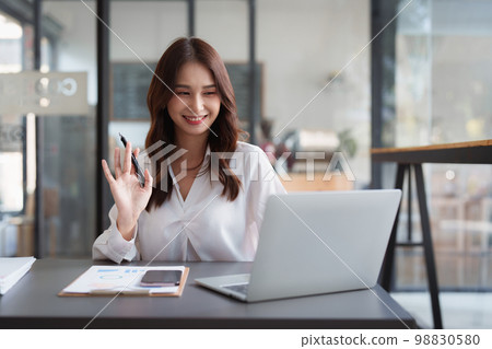 Portrait of business accountant using laptop for analyze financial data. finance, tax, accounting concept Portrait of business accountant using laptop for analyze financial data. finance, tax, accounting concept 98830580