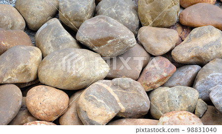 Background pattern of river rocks with rounded corners and some smooth surface. 98831040