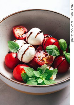 Freshly made italian salad caprese Freshly made italian salad caprese 98831287