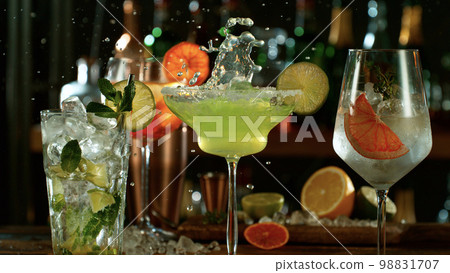 Fresh various cocktails on the bar, dark toned background 98831707