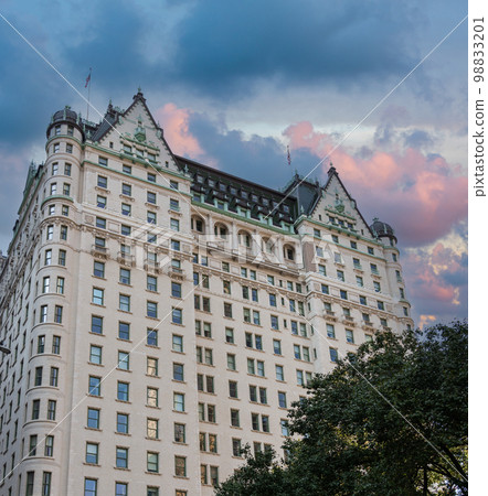 The famous facade of the Plaza Hotel in New York next to Central Park 98833201