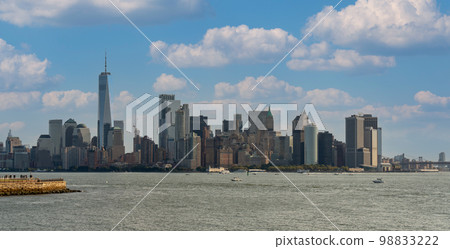 View on Liberty Island overlooking downtown Manhattan, New York, USA 98833222
