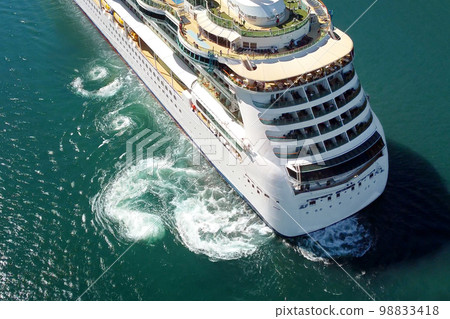 Drone aerial view of large ocean liner while sailing in the sea. Top view from drone of luxury cruise ship. 98833418