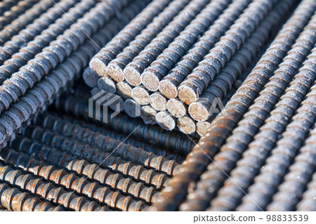 Steel construction rods coated with frost. A set of reinforced steel. metal, iron background. Steel construction rods coated with frost. A set of reinforced steel. metal, iron background. 98833539