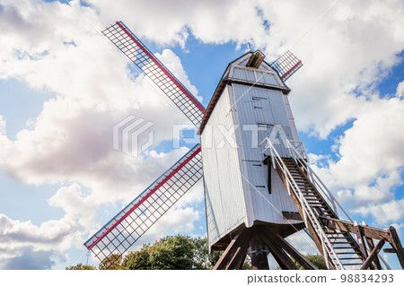 Rustic wooden windmill in idyllic Bruges public park, Belgium Rustic wooden windmill in idyllic Bruges public park, Belgium 98834293