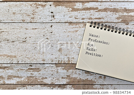 A notebook with a persona model and a profile A notebook with a persona model and a profile 98834734
