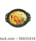 Potato gratin in black pan isolated white background 98835439