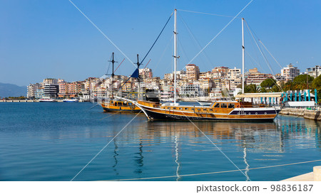 Vintage wooden sailboats moored in Sarande harbor on Ionian Sea Vintage wooden sailboats moored in Sarande harbor on Ionian Sea 98836187