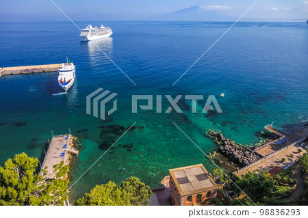Sorrento city cliffs and marina with boats and yacht, amalfi coast, Italy 98836293